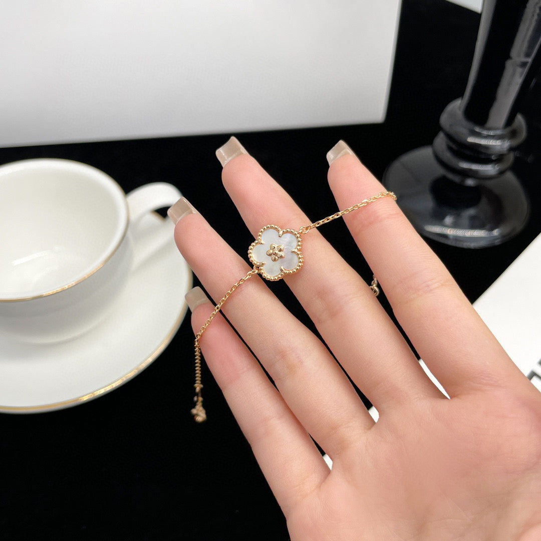ˇGilded EraˇLUCKY WHITE MOP PLUM BLOSSOM  BRACELET