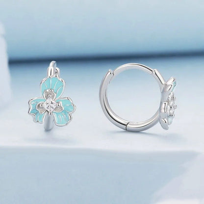 [STREET] Blaue Emaille-Ohrclips mit Iris-Blumenmotiv