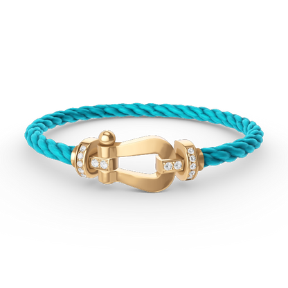 ˇGilded EraˇFORCE LARGE HORSESHOE HALF DIAMOND BRACELET GOLD
